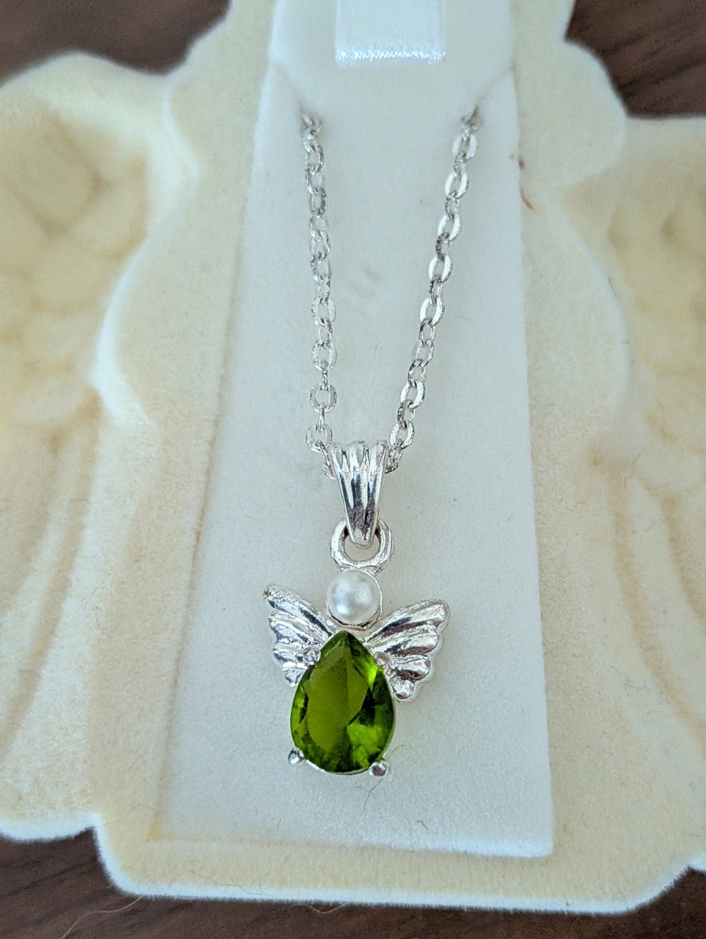 Silver Angel Pendant Necklace with Teardrop Peridot